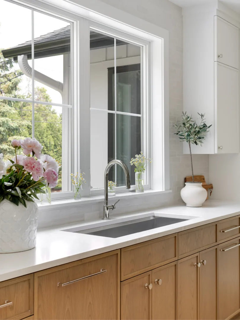 New construction kitchen with window overlooking yard